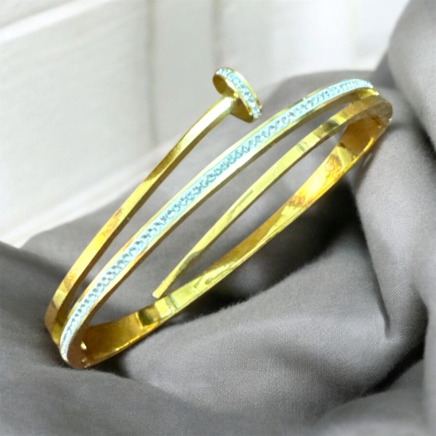 Nail Shaped Bracelet With American Diamond